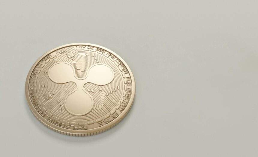 photo of round gold colored coin
